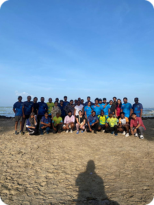 Beach Walk group on sandy shore
